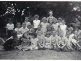 My Second Grade Class Party. Front Row Me First on Left, My Brother Last On Right.